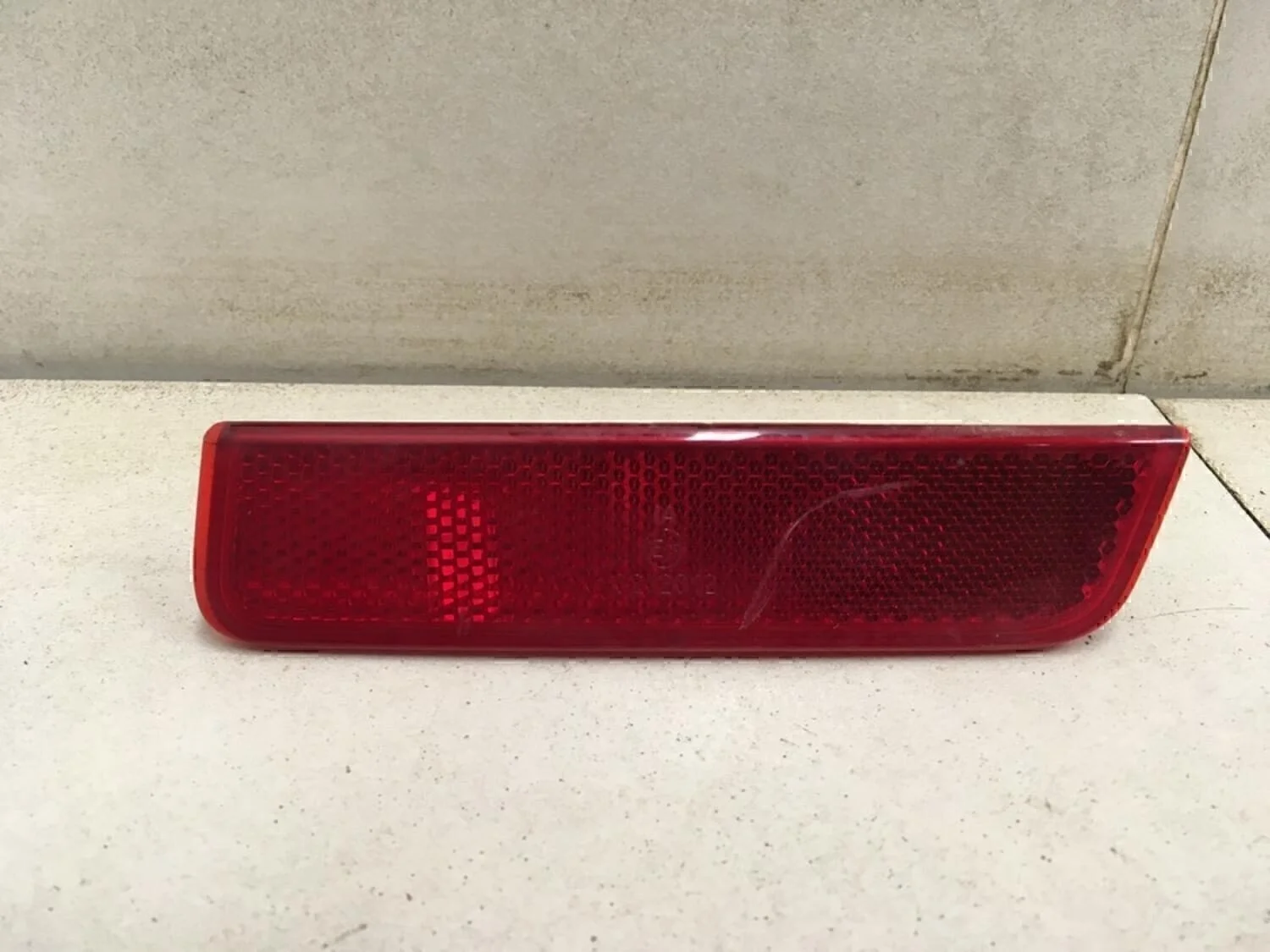 Отражатель в бампер задний правый Duster 2012>