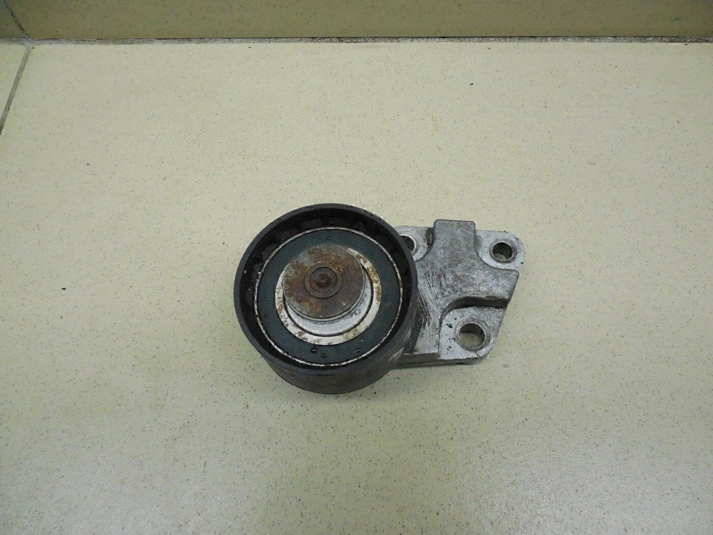 Ролик-натяжитель ремня ГРМ Aveo (T200) 2003-2008