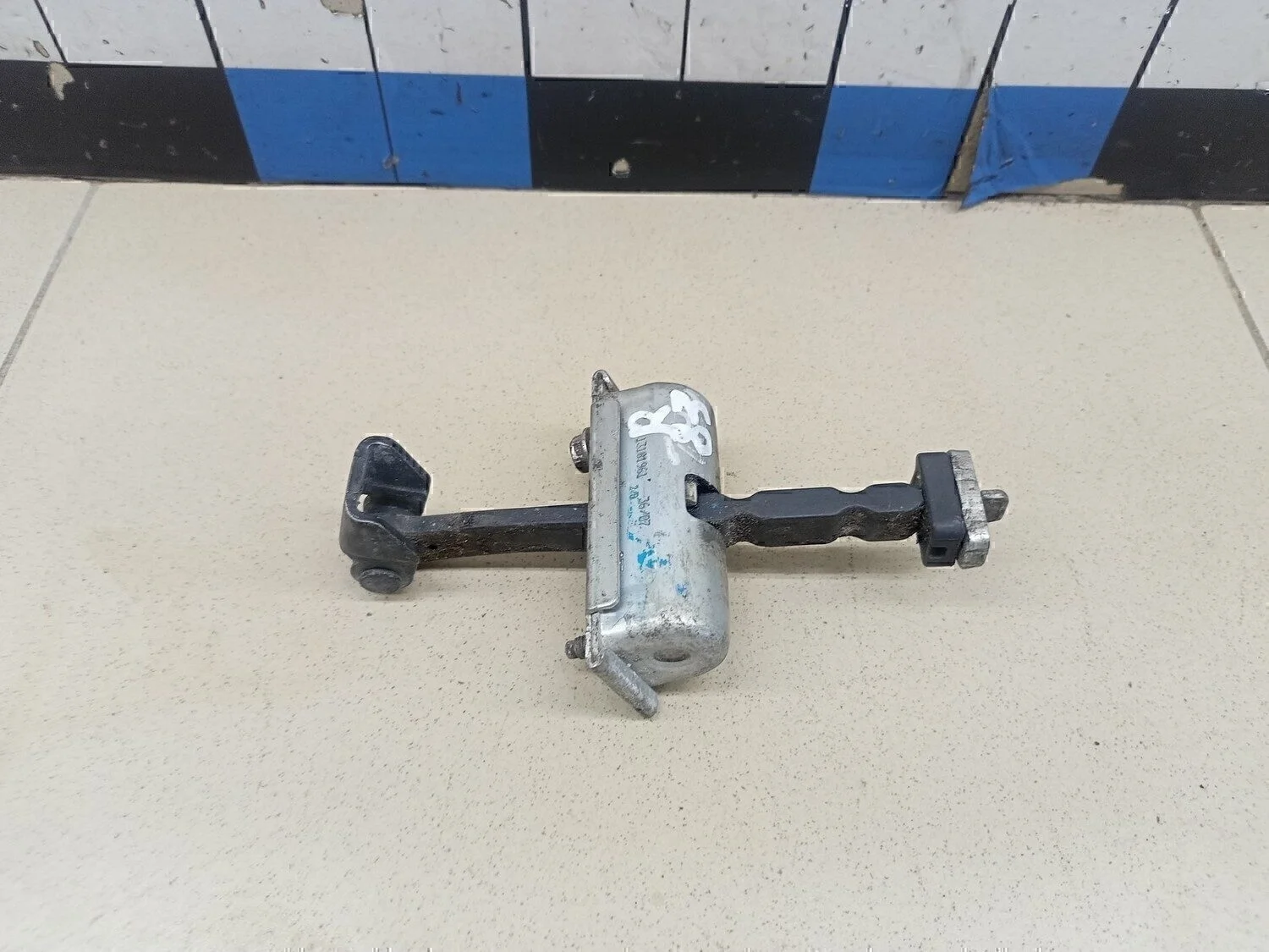 Ограничитель двери Corsa D 2006-2015