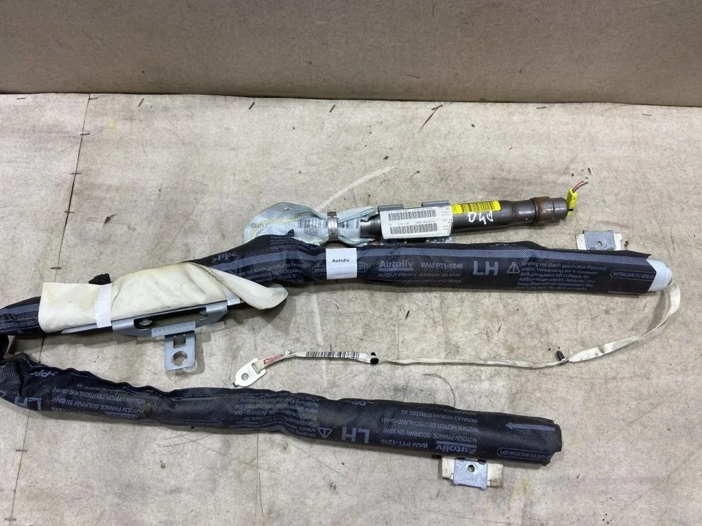 Шторка безопасности левая Nissan Navara D40