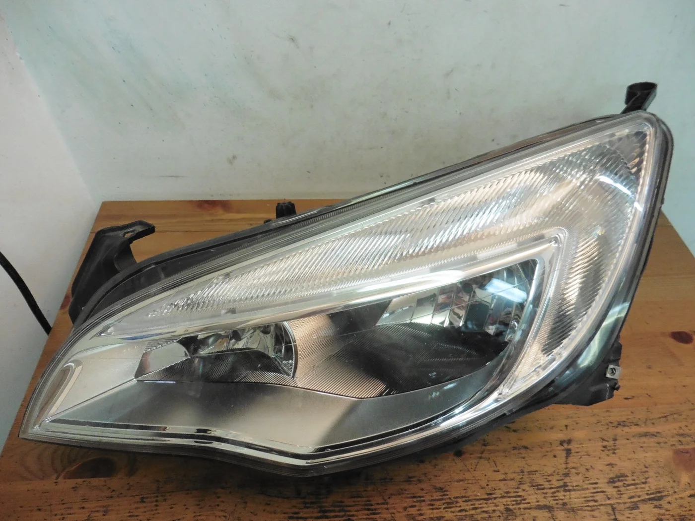 Фара хромированная левая б/у Опель Астра J
