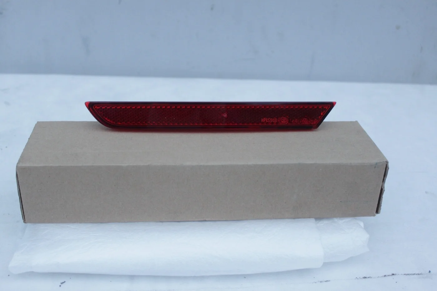 Катафот заднего бампера левый Опель Астра J GTC