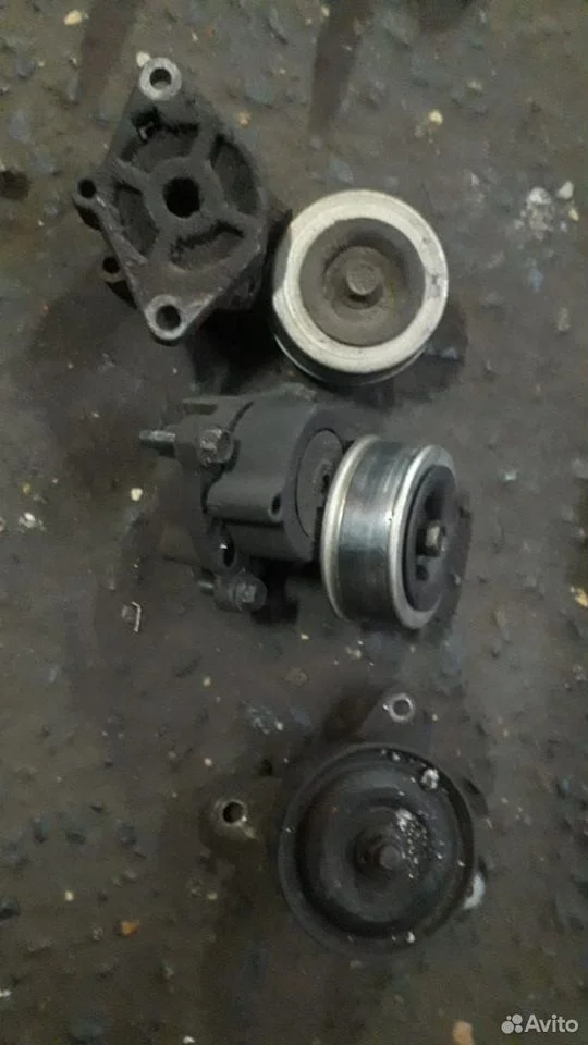 Ролик натяжной обводной Инфинити FX45 S50 разбор