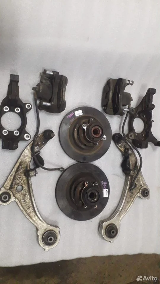 Кулак поворотный передний Ниссан Теана J32 разбор