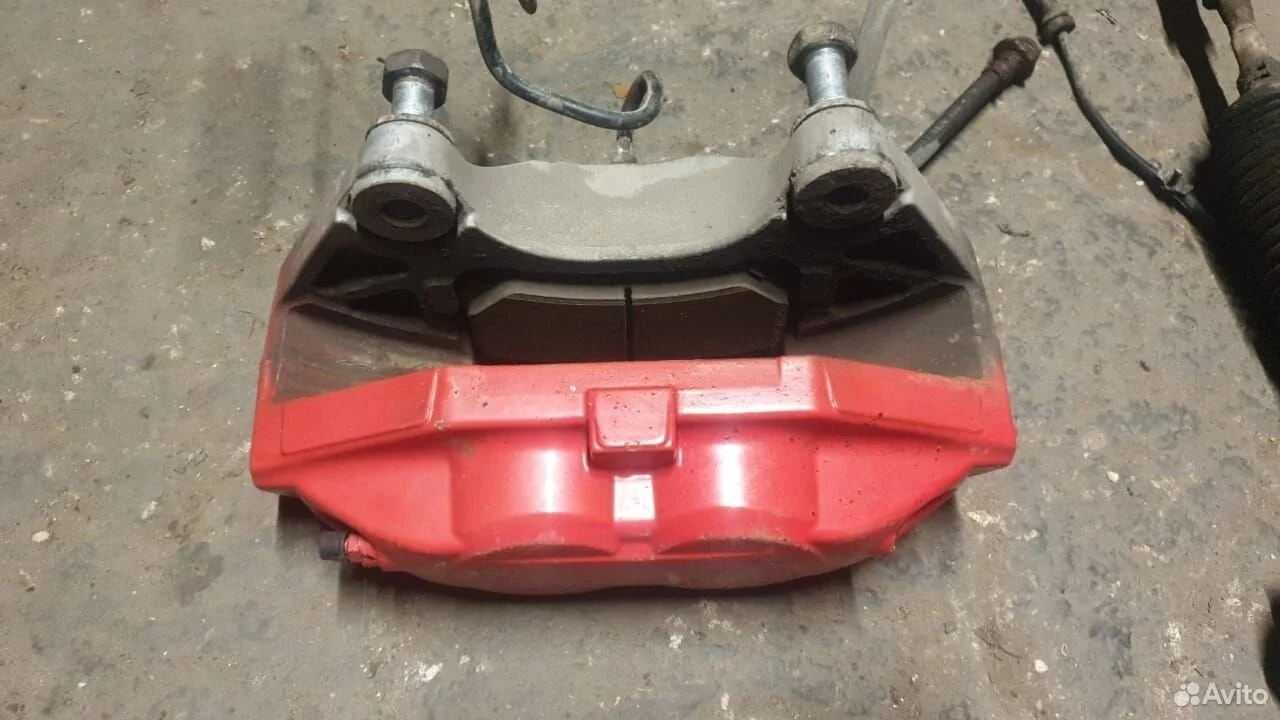 Суппорт тормозной передний акебоно инфинити qx70