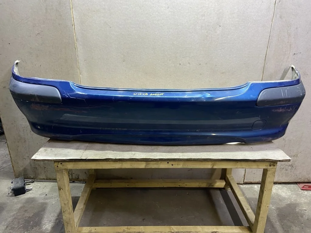 Бампер задний Nissan Almera N16 дорест