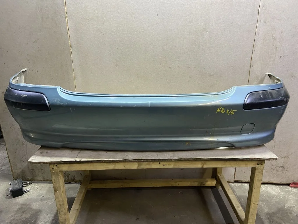 Бампер задний Nissan Almera N16 хэтчбек