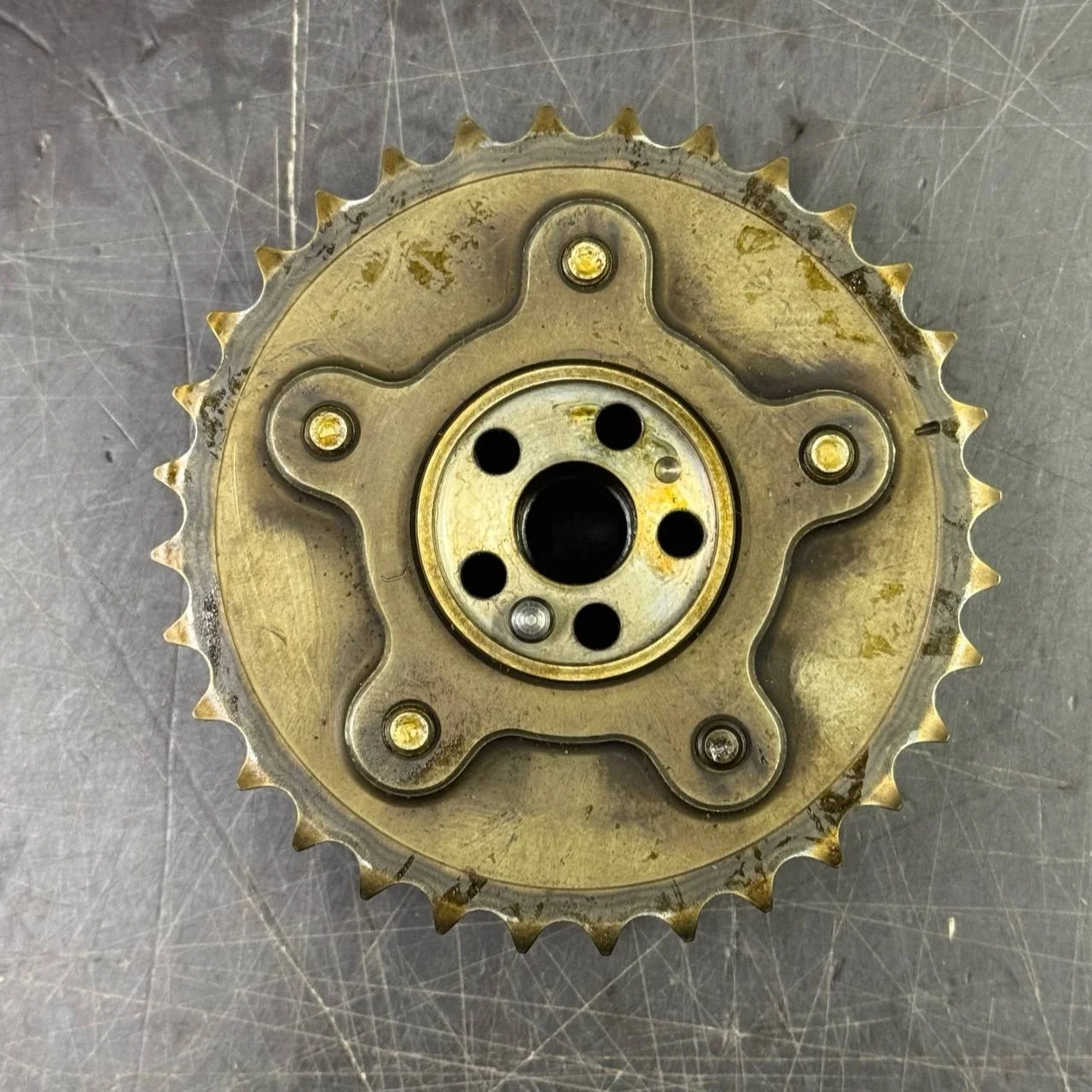 [Б/У] Механизм изменения фаз ГРМ (выпуск / 7-12 цил) Audi A8 VW Touareg [Код: 00295424 ]