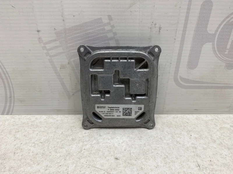 Блок управления фарой BMW X5 2012 E70