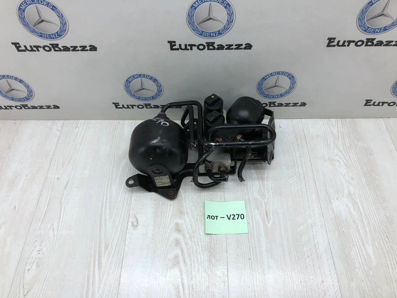 Блок клапанов гидроподвески Mercedes R230