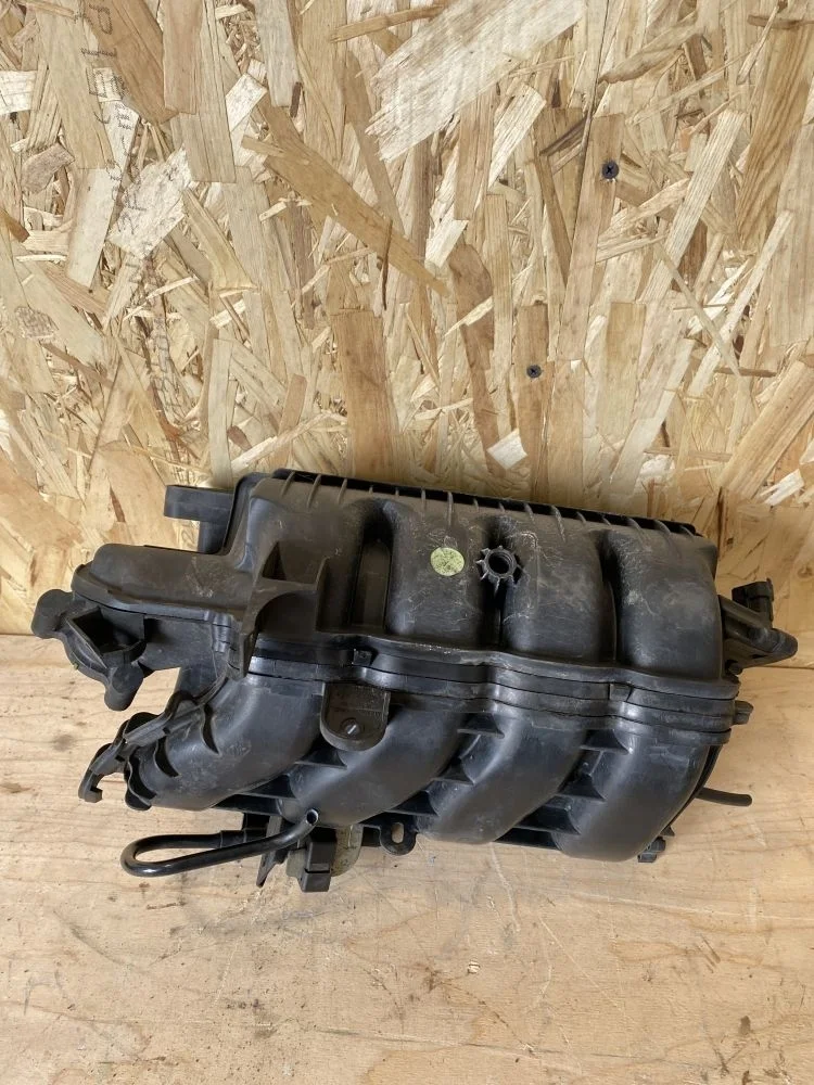 Коллектор впускной Opel Corsa D (2006—2010) 2010