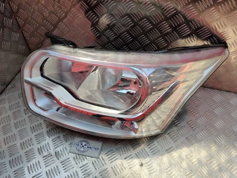 Фара левая Ford Transit 2387746 TTG