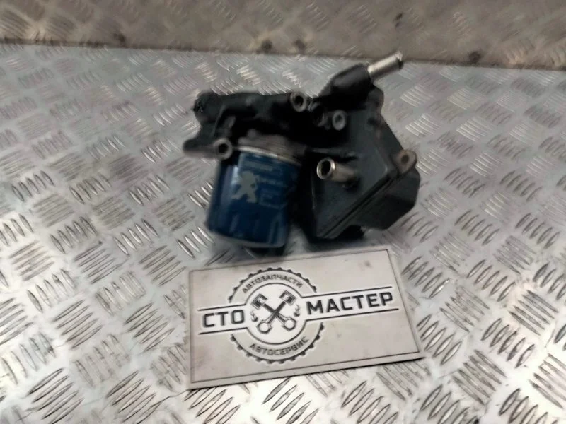 Теплообменник масляный Ford Transit 2007522 2.2