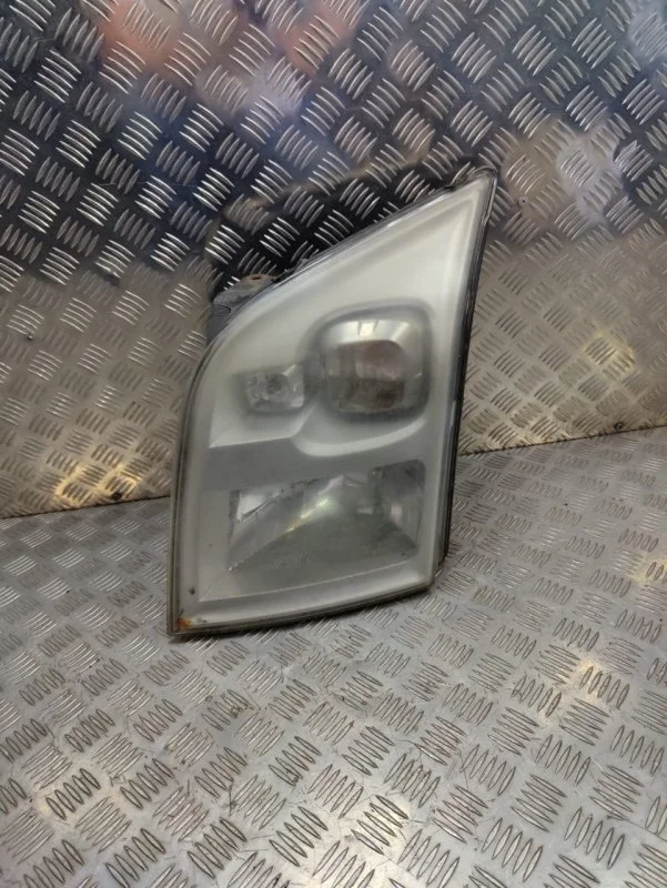 Фара левая Ford Transit 1684410 TT9