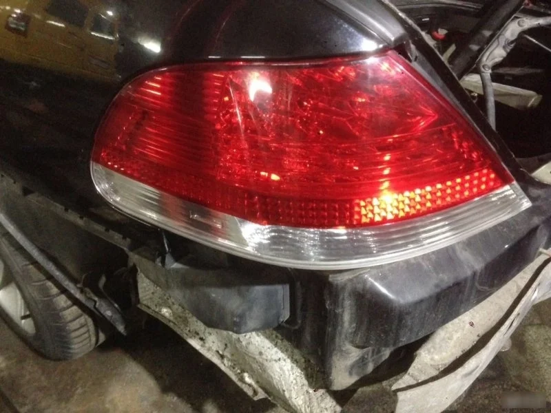 Фонарь наружный Bmw 7 63216937235 E65, левый