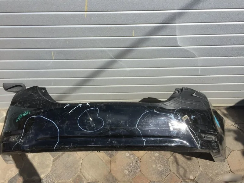 Бампер Toyota Corolla 5215902999 E18, задний