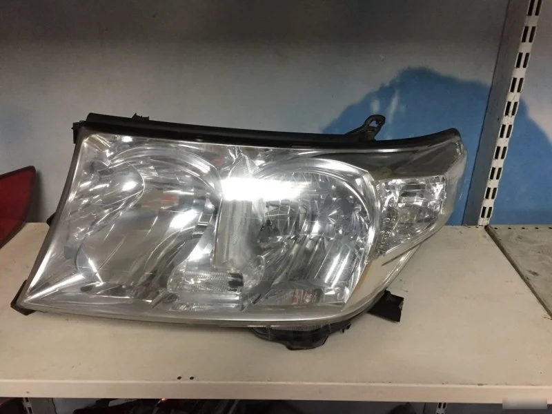 Фара Toyota Land Cruiser 8117060C82 200, левая