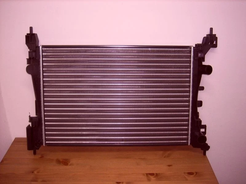 Радиатор охлаждения новый неориг Опель Корса Д 06-