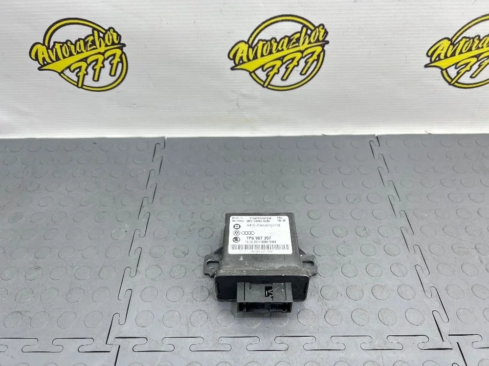 Блок управления светом Volkswagen Touareg II (2010—2014)