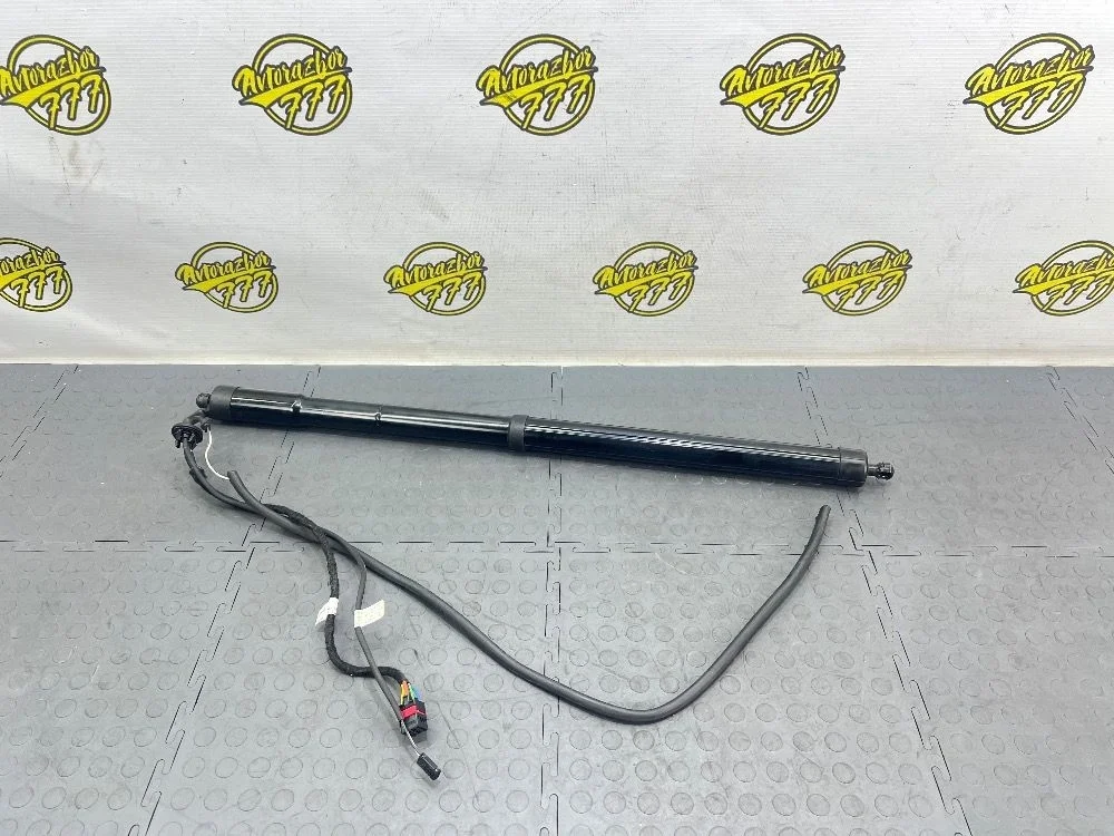 Амортизатор крышки багажника Volkswagen Touareg II (2010—2014)