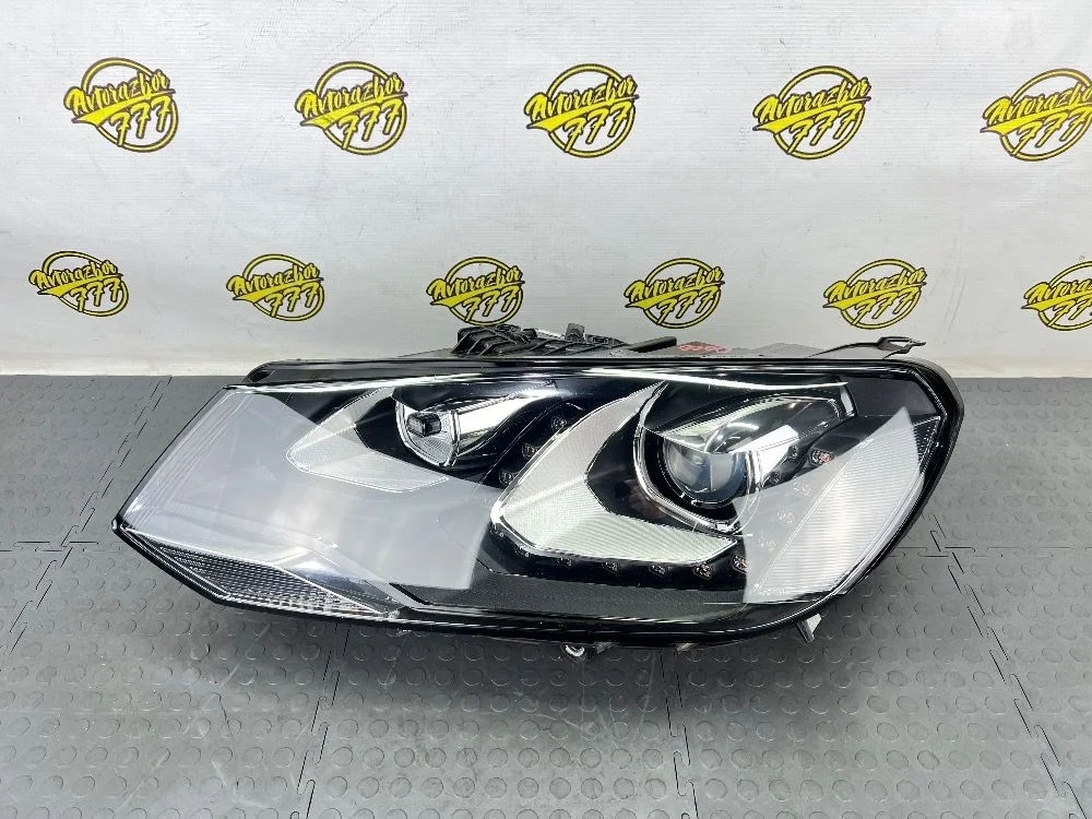 Фара левая Volkswagen Touareg II (2010—2014)