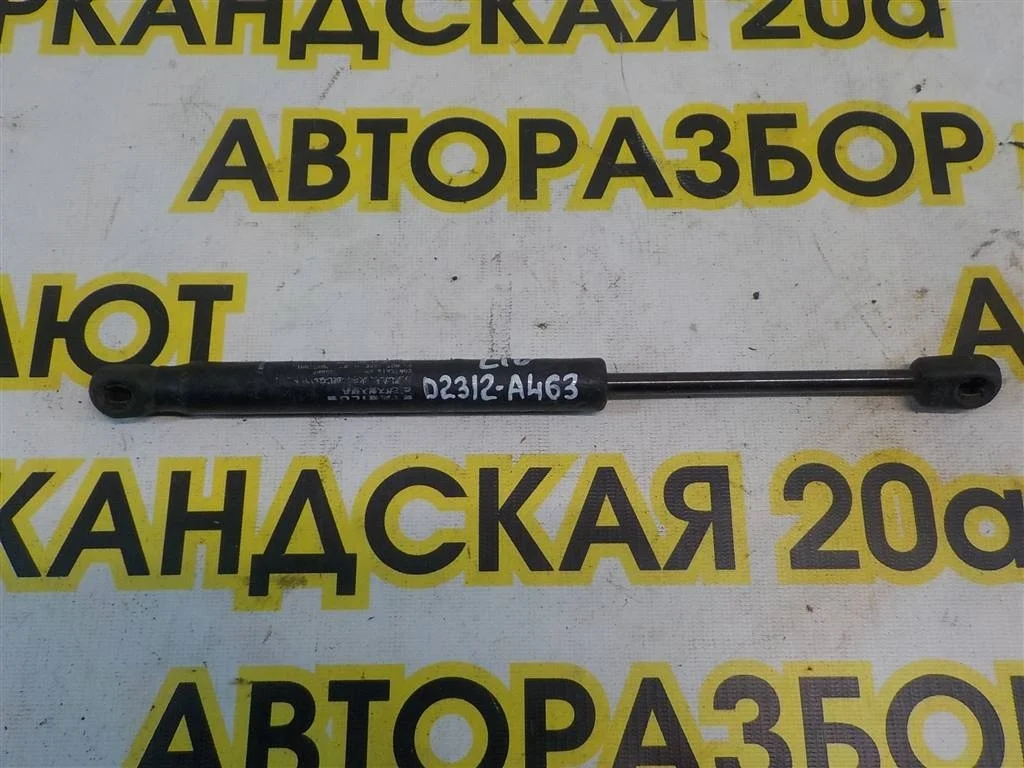 Амортизатор крышки багажника Mitsubishi Lancer X (2007—2010)