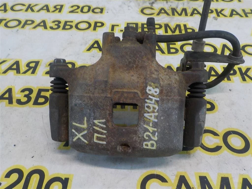 Суппорт передний левый Mitsubishi Outlander I (2002—2009)