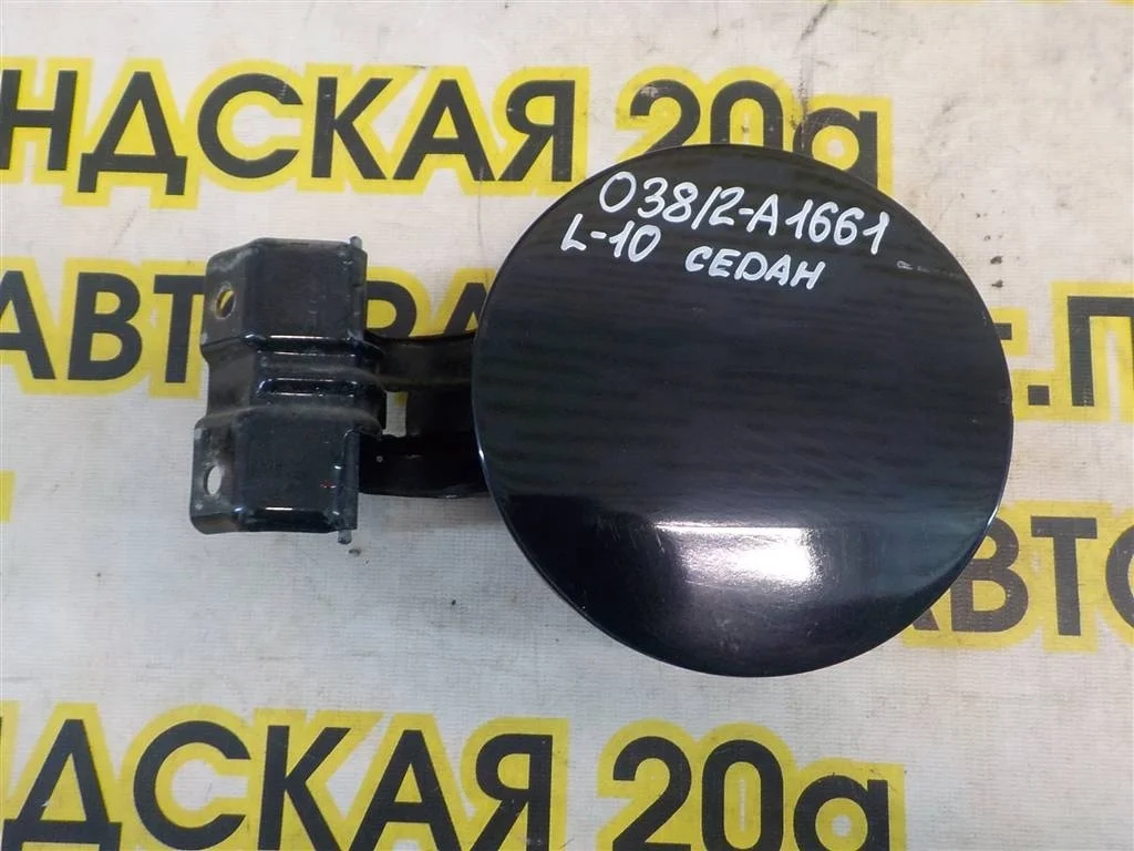 Лючок бензобака Mitsubishi Lancer X (2007—2010)