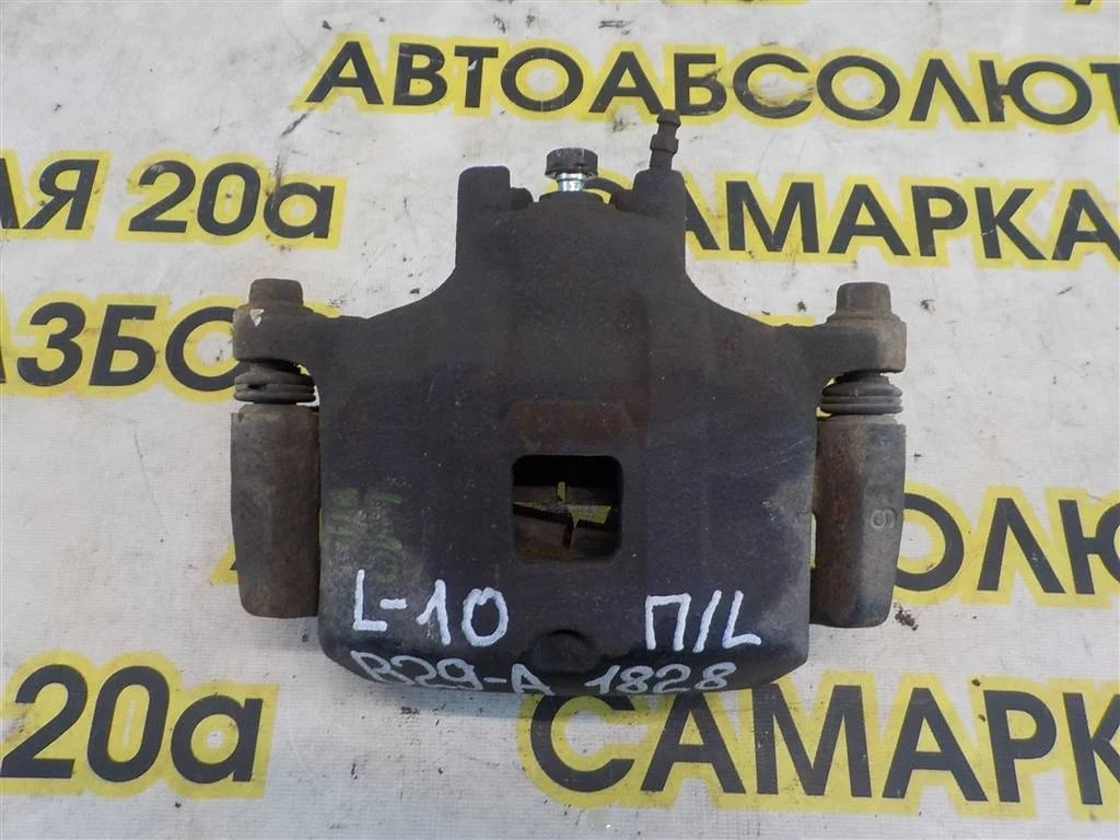 Суппорт передний левый Mitsubishi Lancer X (2007—2010)