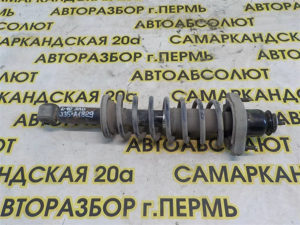 Амортизатор задний Mitsubishi Lancer X (2007—2010)