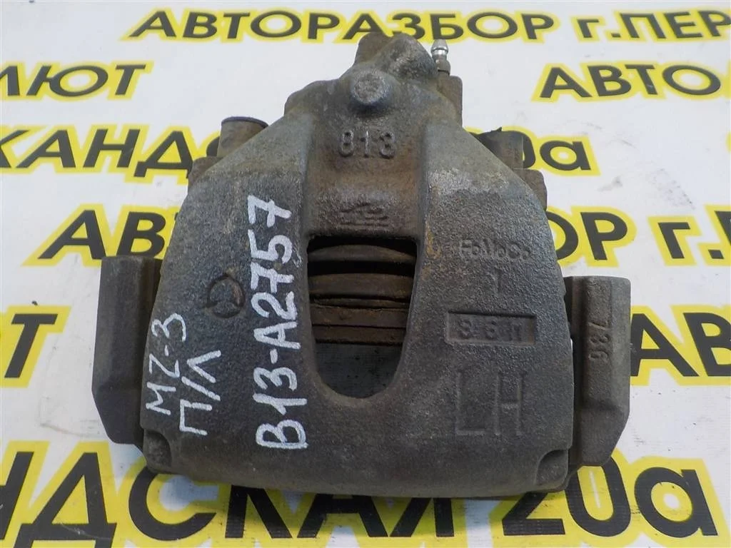 Суппорт передний левый Mazda 3 BK (2003—2006)