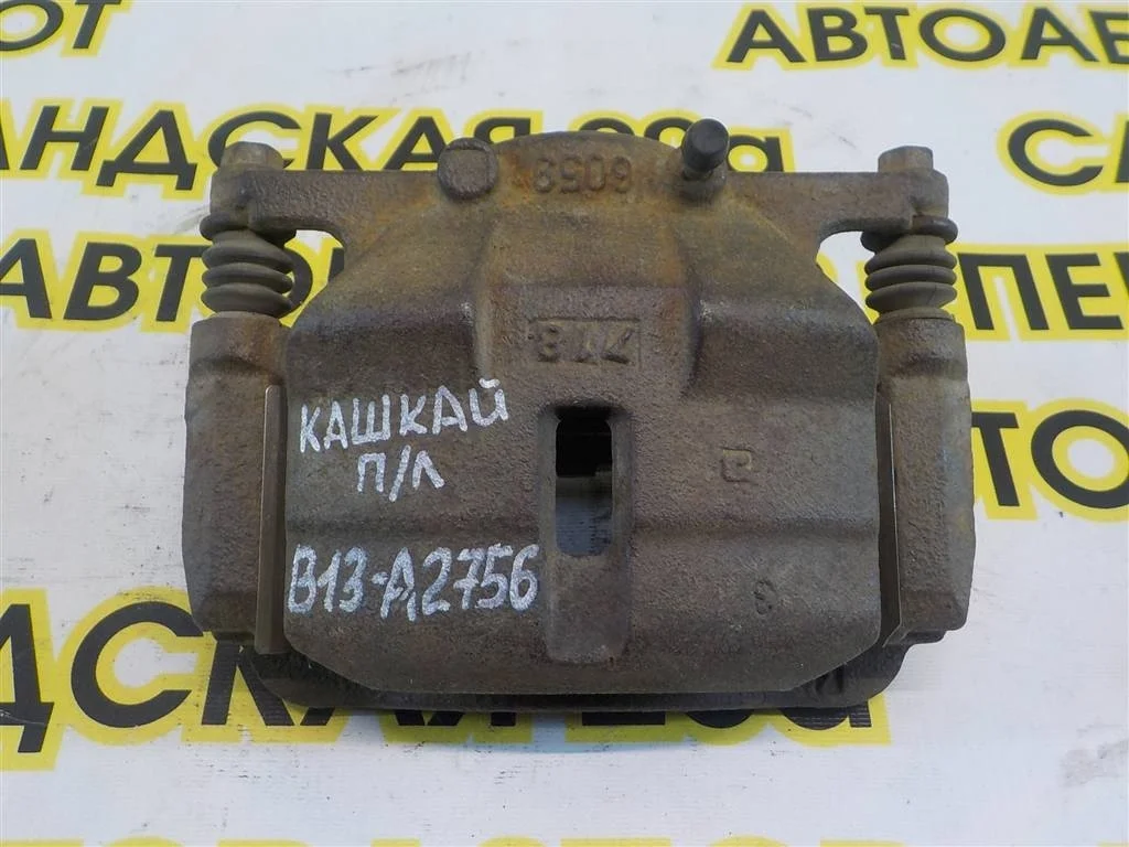 Суппорт передний левый Nissan Qashqai I (2006—2010)