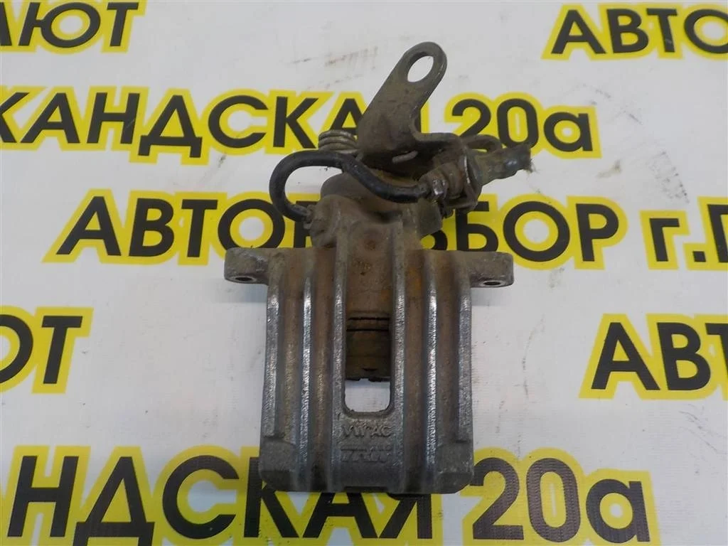 Суппорт задний левый Volkswagen Golf Mk5 (2003—2009)