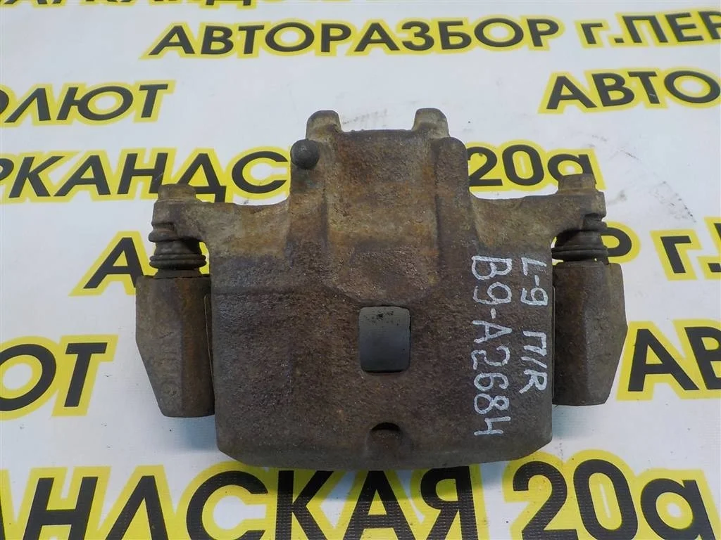 Суппорт передний правый Mitsubishi Lancer IX (2000—2007)