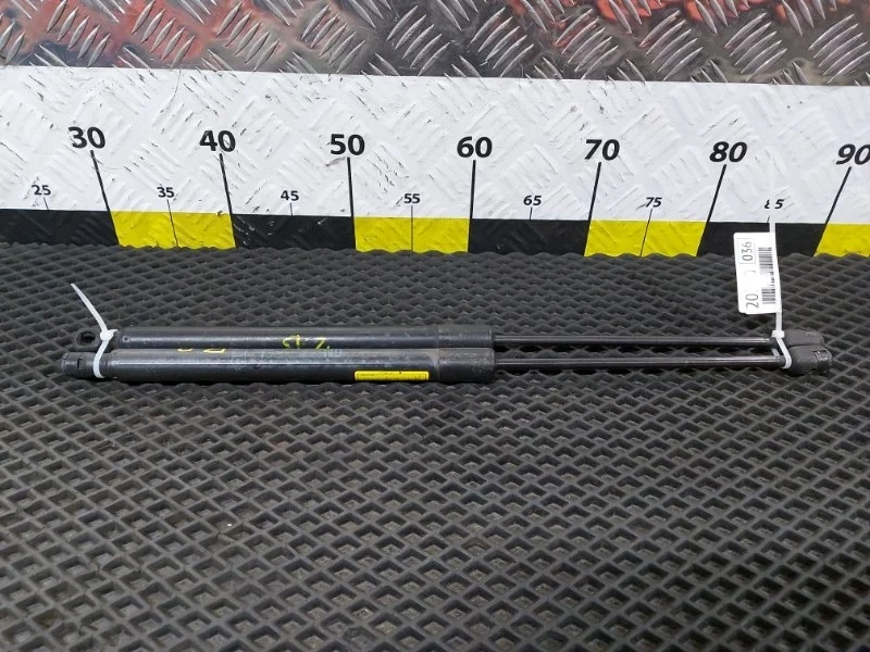 Амортизатор крышки багажника Opel Zafira B 13128759 L75 Z22YH