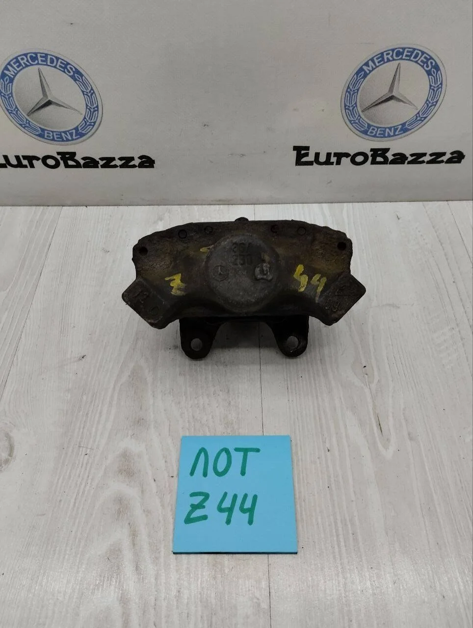 Суппорт тормозной задний левый Mercedes W210