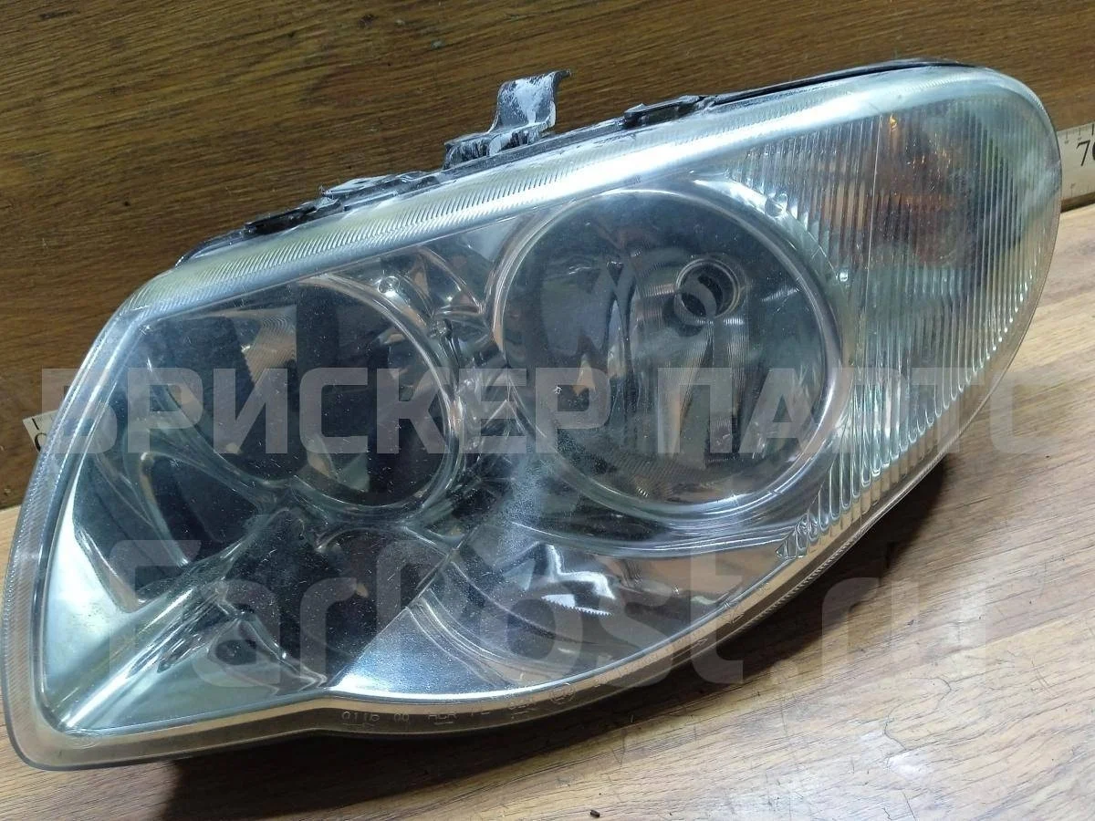 Фара левая Крайслер Вояджер 4  (RG)