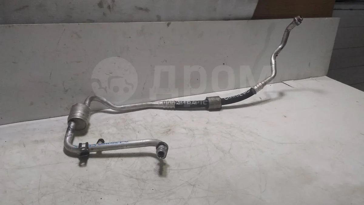 Трубка кондиционера Рено Сандеро 1