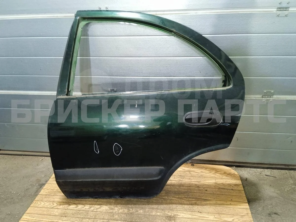 Дверь задняя левая Ниссан Альмера 2  (N16)