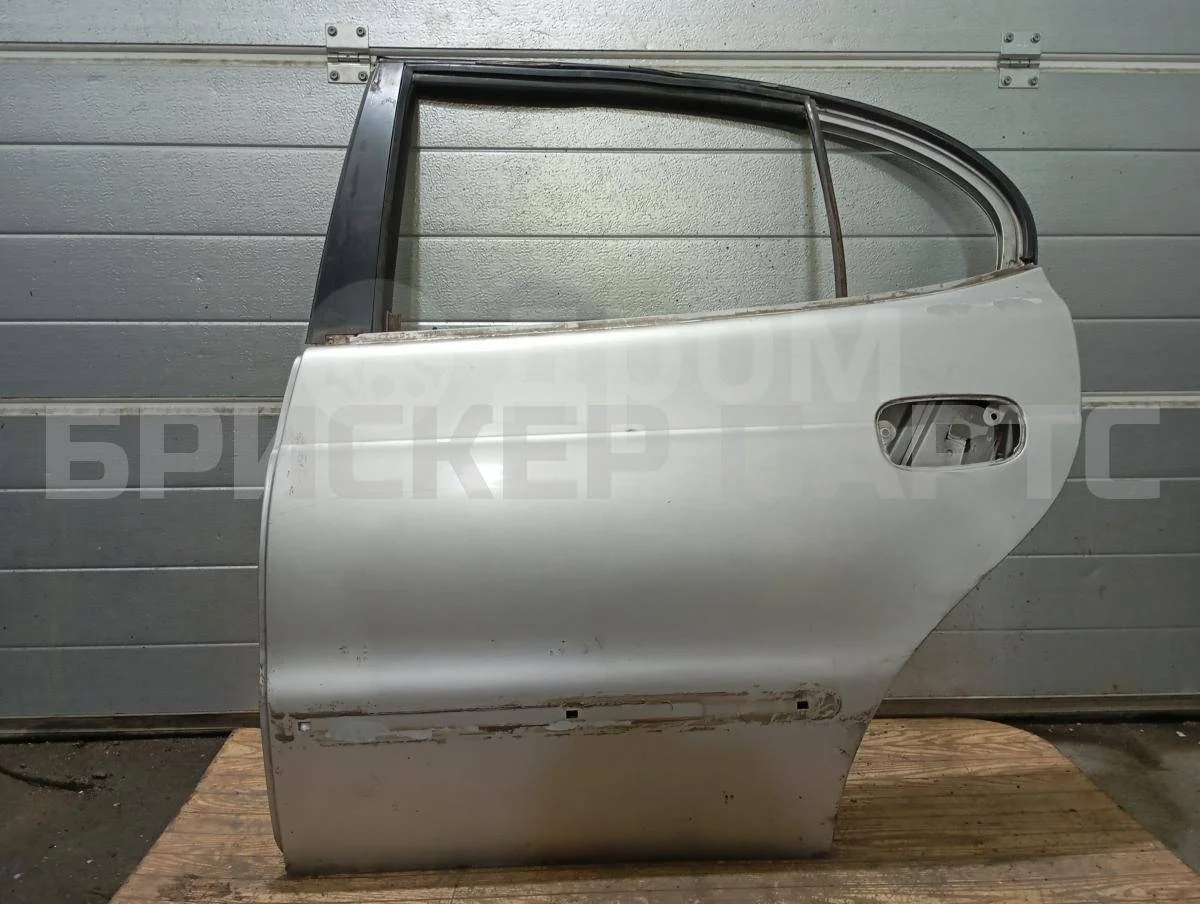 Дверь задняя левая Дэу Леганза 1  V100