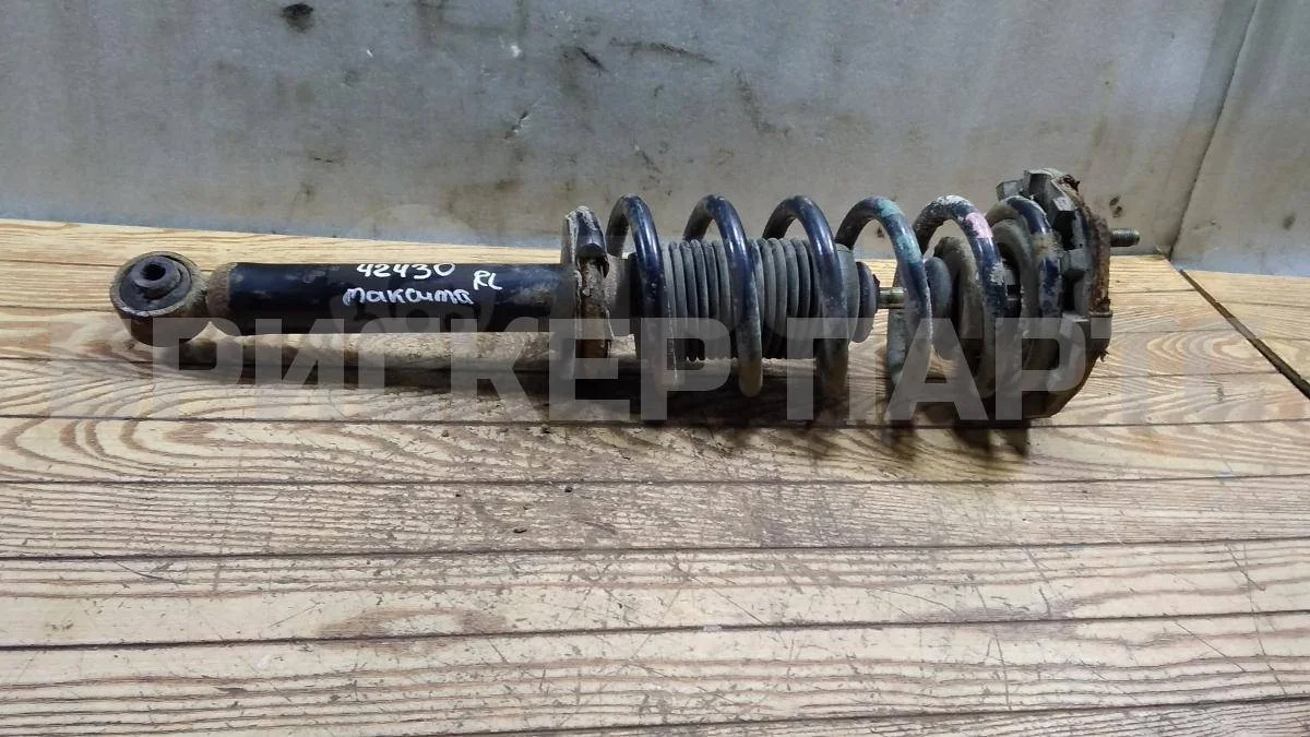 Стойка аморт левая Ниссан Максима 5  A33