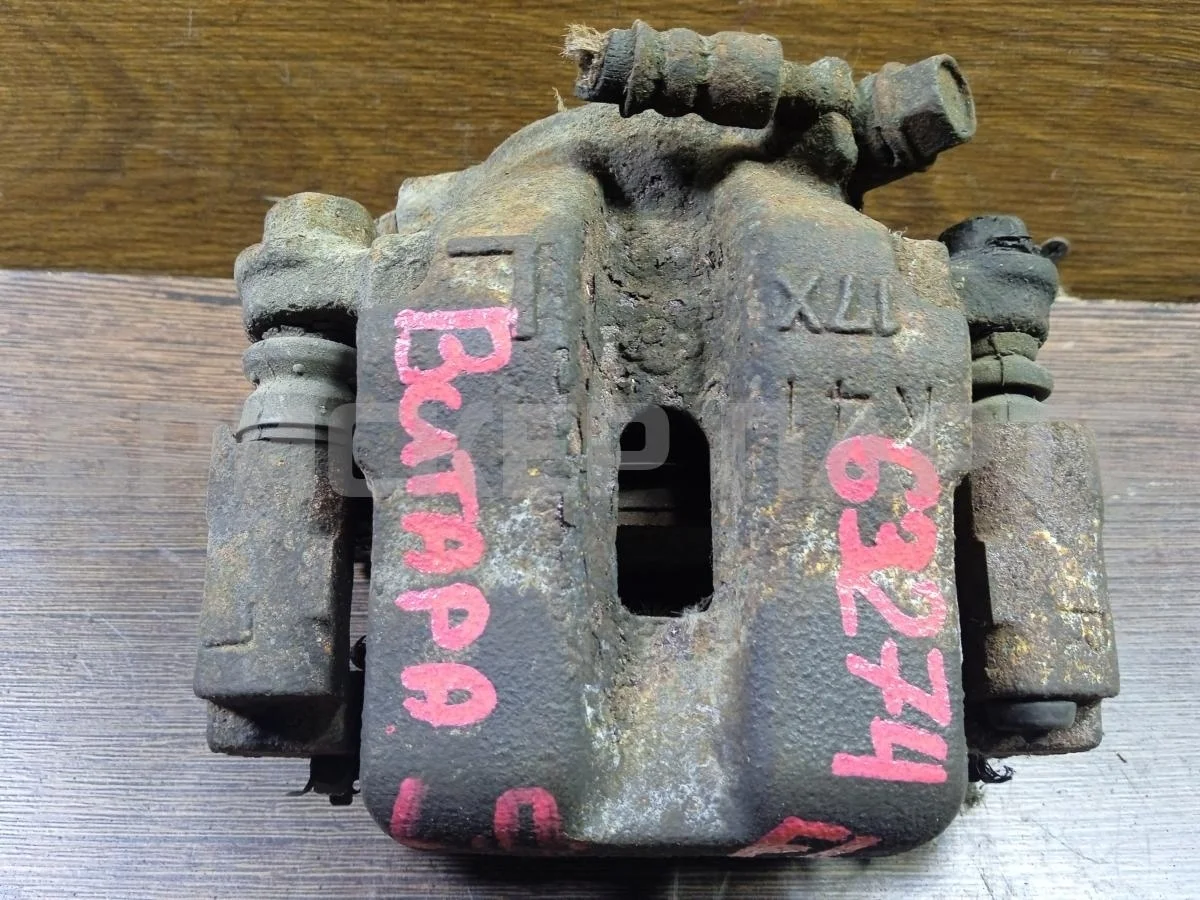 Суппорт передний Сузуки Гранд Витара 1