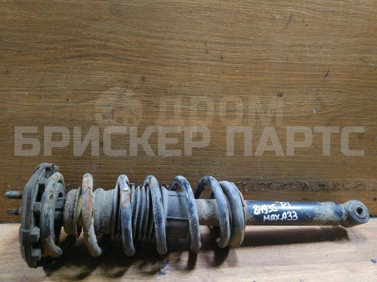 Стойка аморт левая Ниссан Максима 5  A33