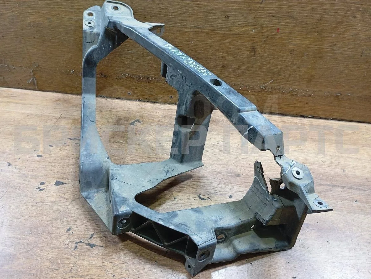 Кронштейн фары Митсубиси Кольт 6  Z30