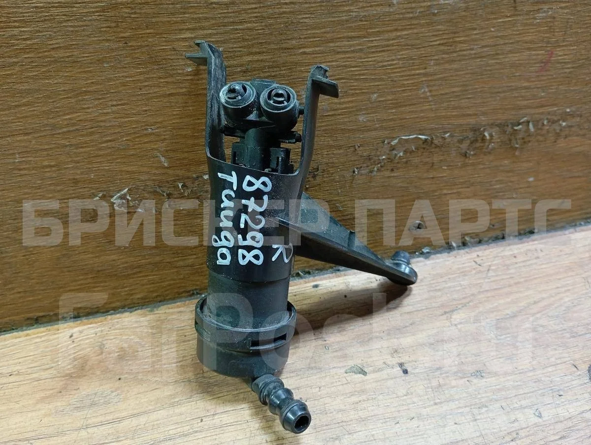 Форсунка омыв. фар Ниссан Тиида 1  C11