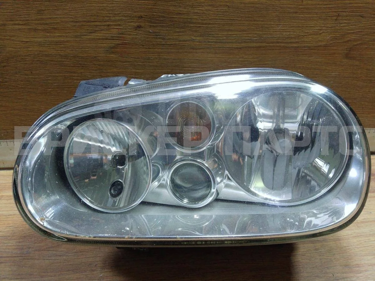 Фара левая Фольксваген Гольф Mk4