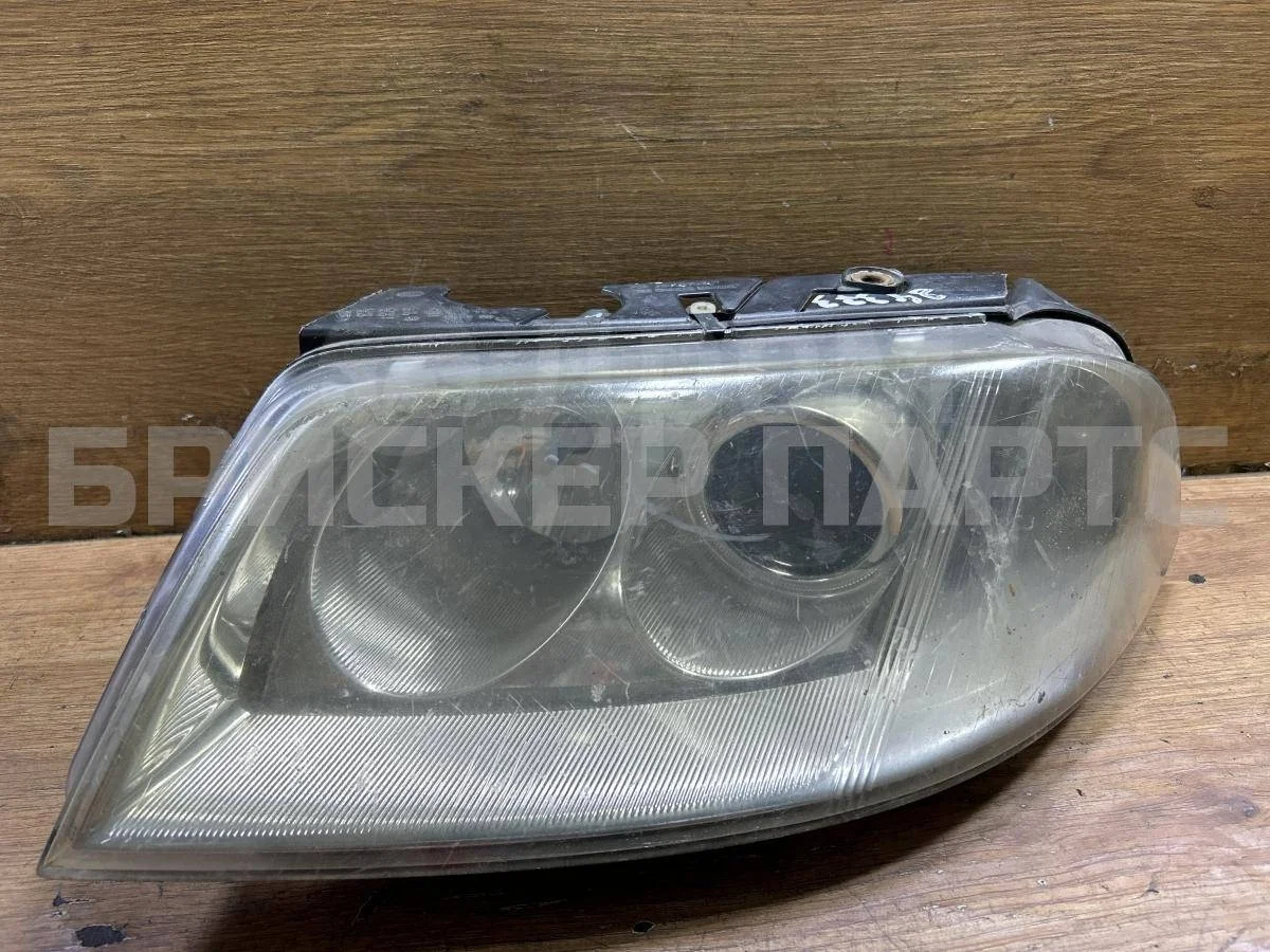 Фара левая Фольксваген Пассат Б5+ (плюс)