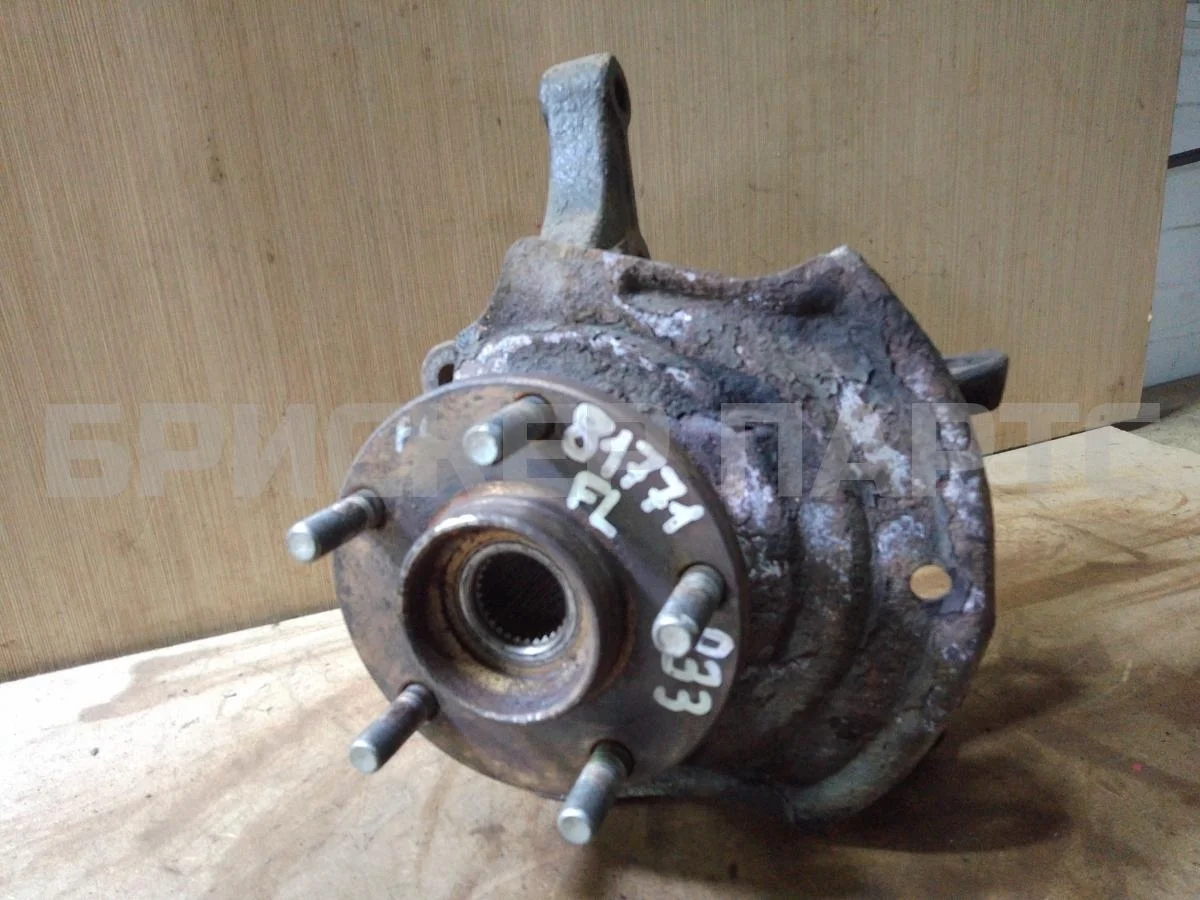 Кулак поворотный лев Ниссан Максима 5  A33