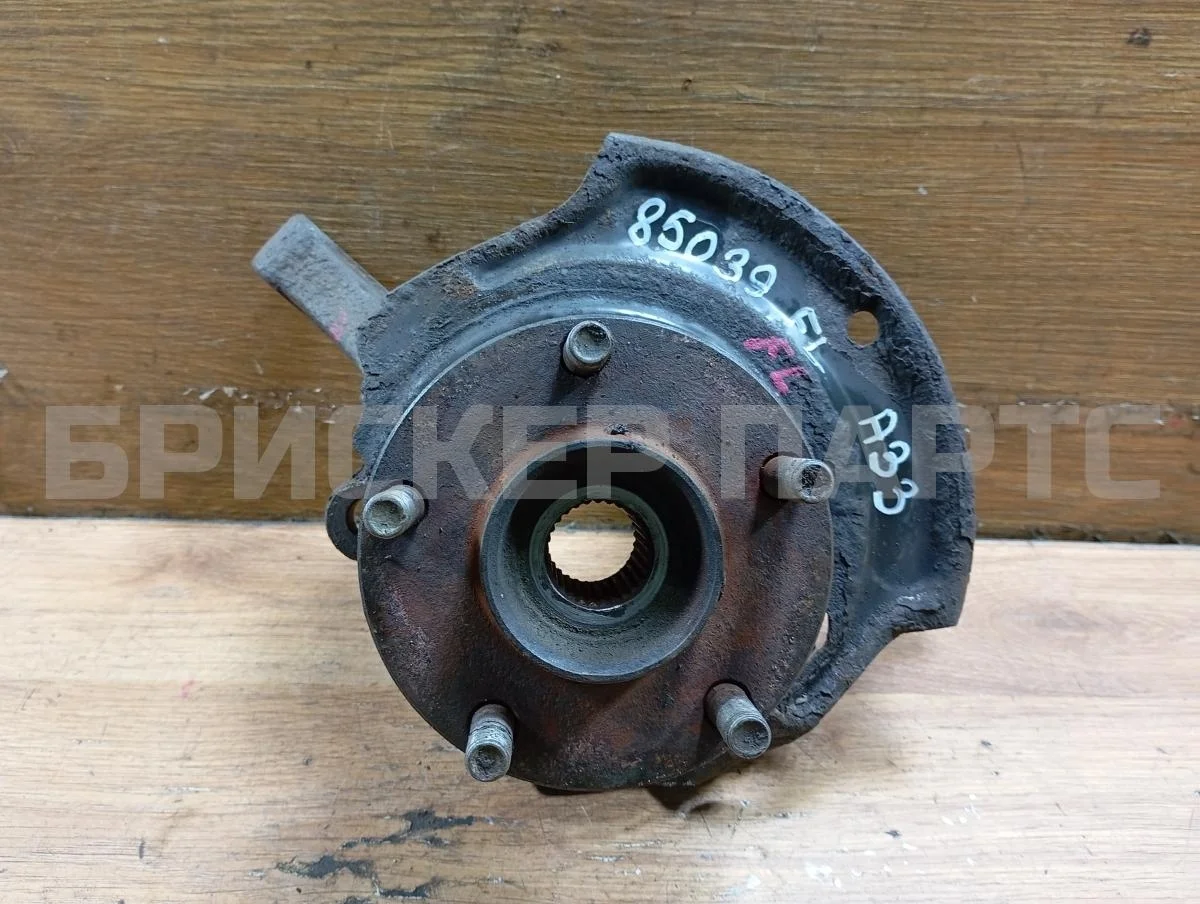 Кулак поворотный лев Ниссан Максима 5  A33