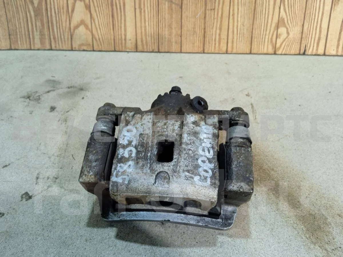 Суппорт задний Киа Соренто 1 серия BL